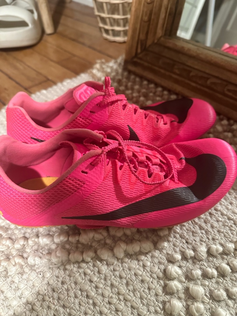 Nike ZOOM Pink  track and field spikes with Black Swoosh